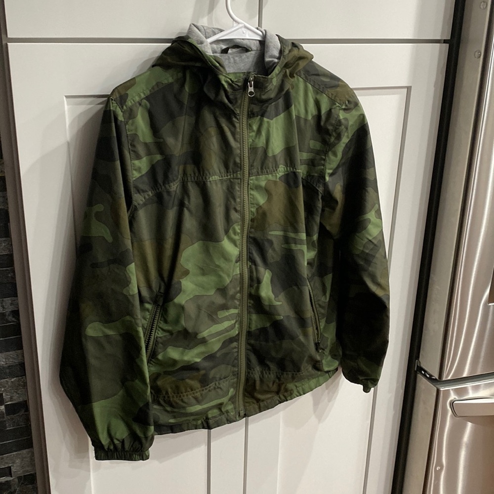 Green camouflage raincoat